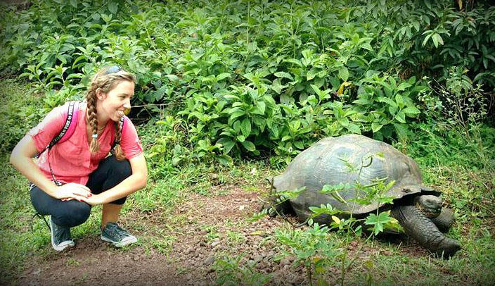Veterinary student spotting turtle on Galapagos island
