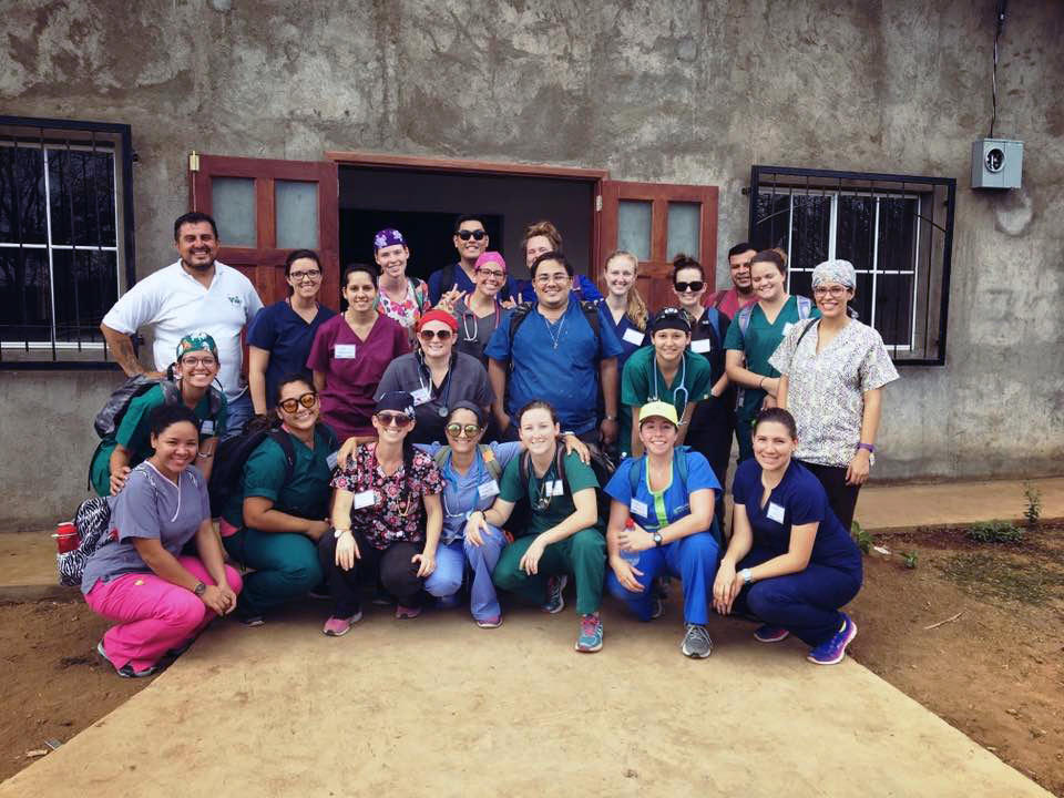 Group of veterinarians in front of a building