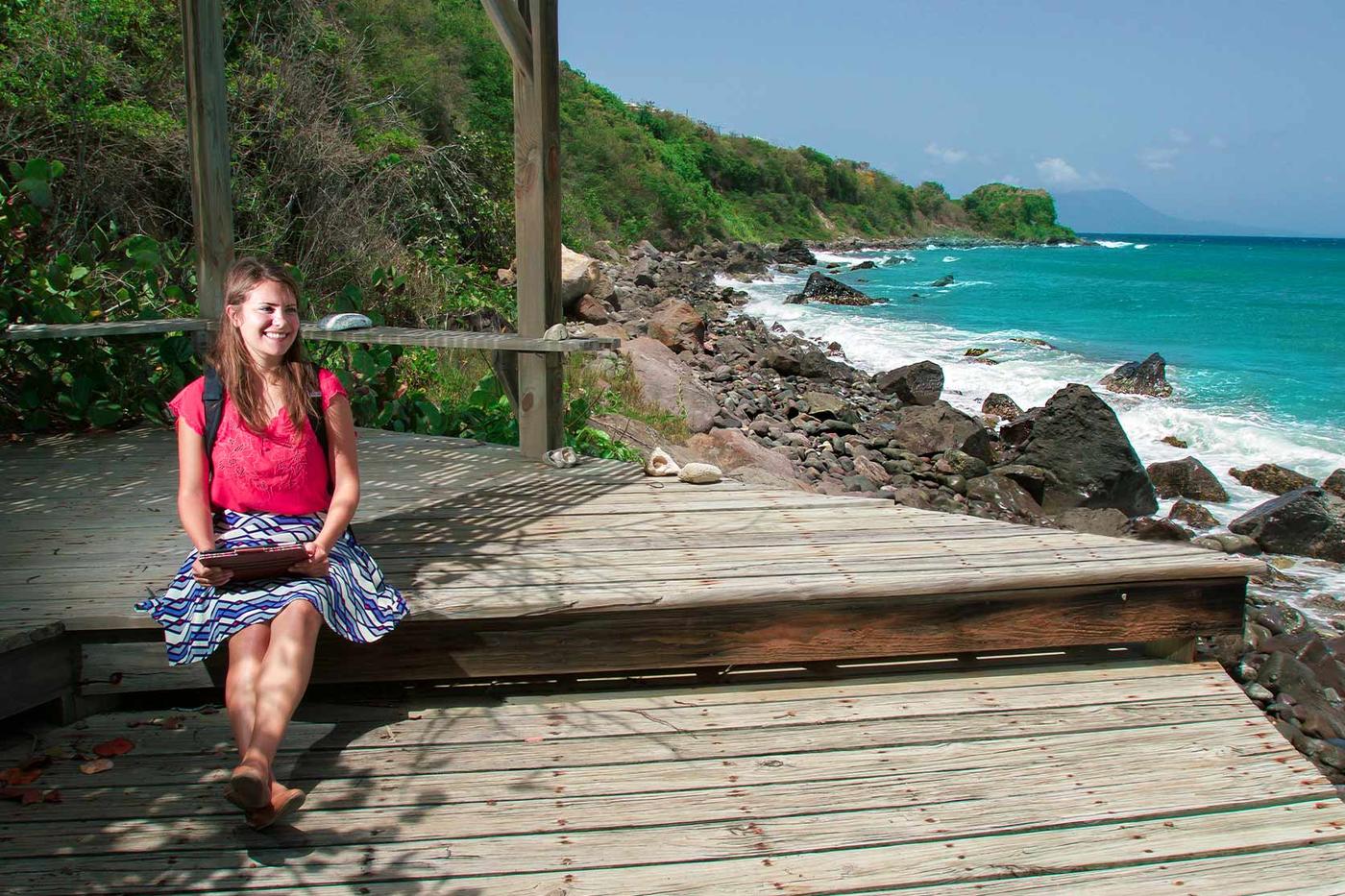 Student on the shore of St. Kitts Island