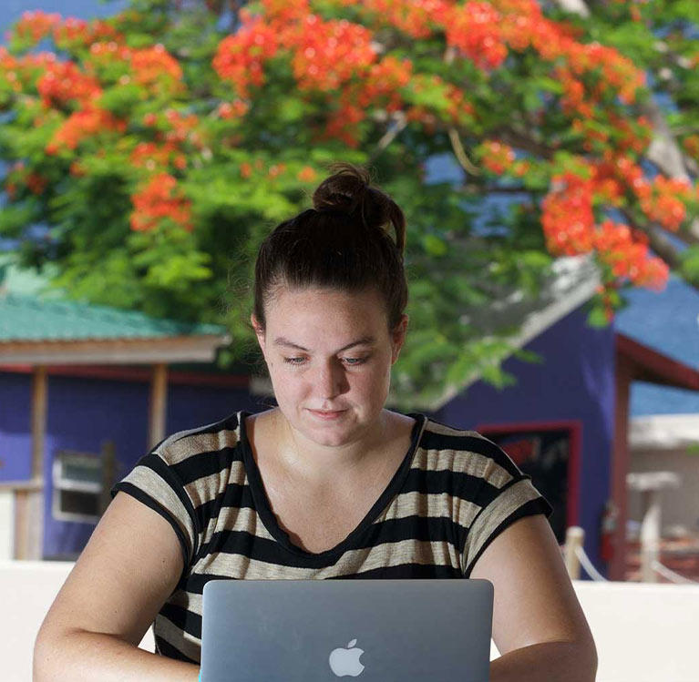 Student studying on her laptop