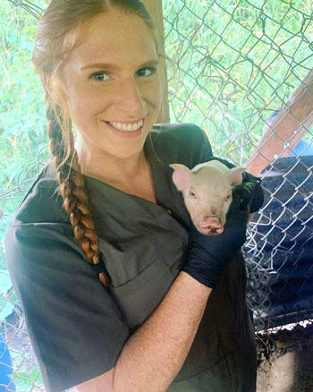 Stephanie Darling - with a pig