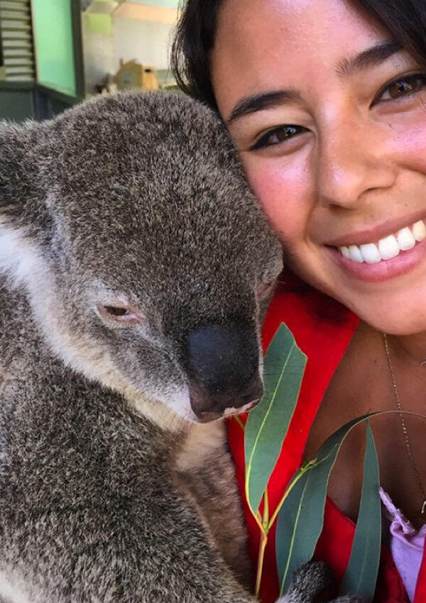 Girl holding a koala