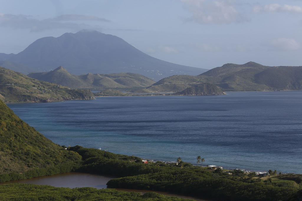 Scenic aerial view of the coast and mountains of St. Kitts
