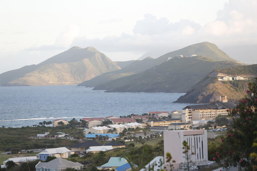 Scenic view overlooking St. Kitts and a background of mountains.